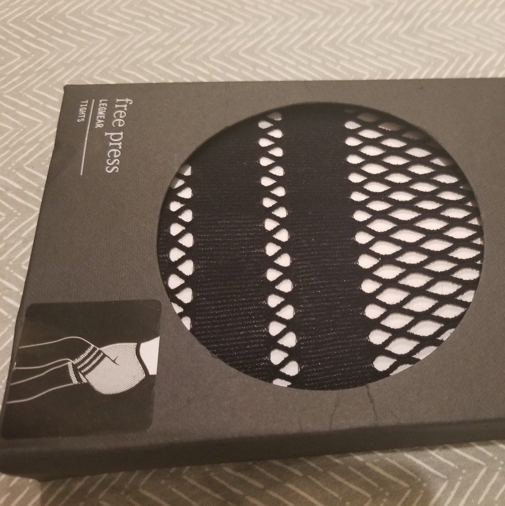 Soft fishnet tights with faux thigh garder bands